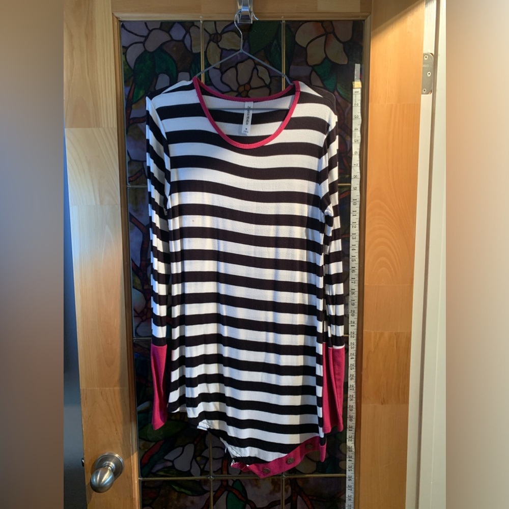 Medium women’s lightweight long sleeve black and white striped top, pink accents